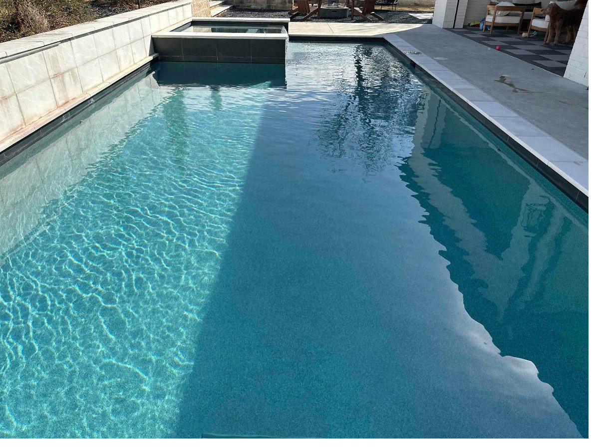Crystal clear residential pool with sparkling blue water in Dallas-Fort Worth